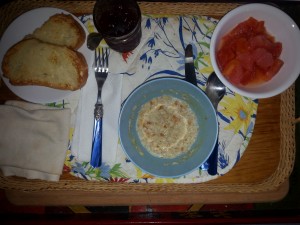 Oatmeal, papaya and thick slices of Italian bread, buttered and broiled with homemade jam. 