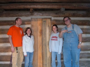 Students rebuilding the Guerrant Cabin