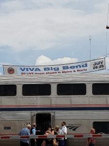 Train with Big Bend sign